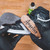 A lifestyle image of Angelus Easy Cleaner in use with brush.