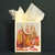 A lifestyle image of a Red Cap Gift Bag, Cactus Scene.