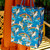 A lifestyle image of a Red Cap Gift Bag, Unicorn Queen, Large.